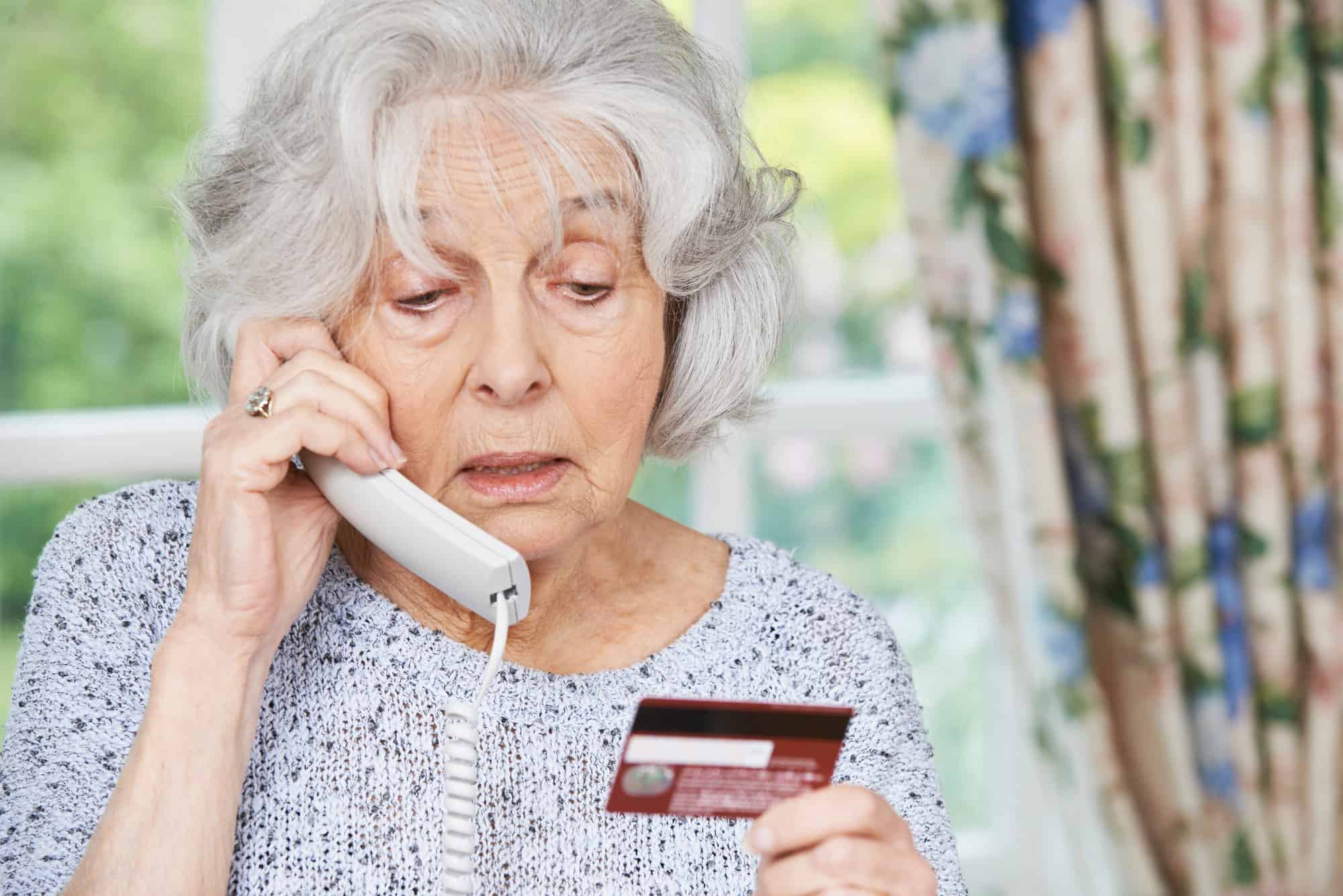 scam old lady on phone credit card